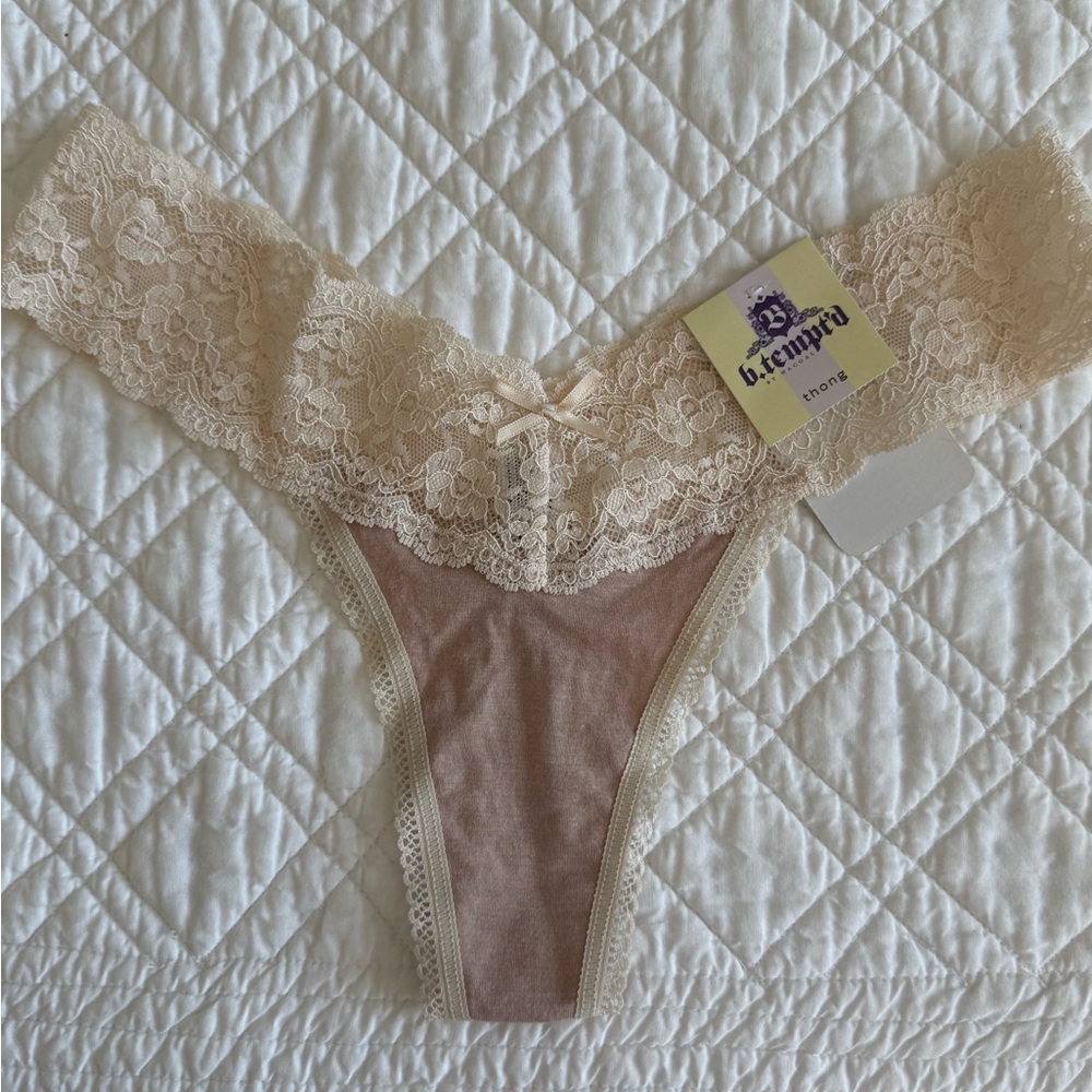 NWT B’tempt’d by Wacoal Blush / Nude and Cream Lace Trim Thong  Size M